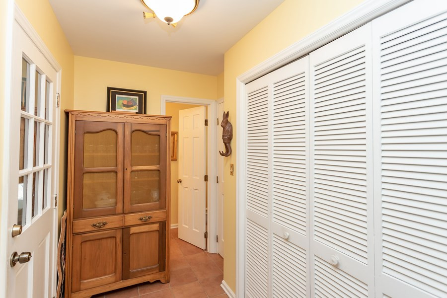 8609 Seagate Drive Raleigh, NC 27615 - Photo 11 of 28 You will find the washer, dryer and 1/2 bath here. Fabulous back steps to enormous bonus room. Enter huge garage with additional work space Side room off kitchen