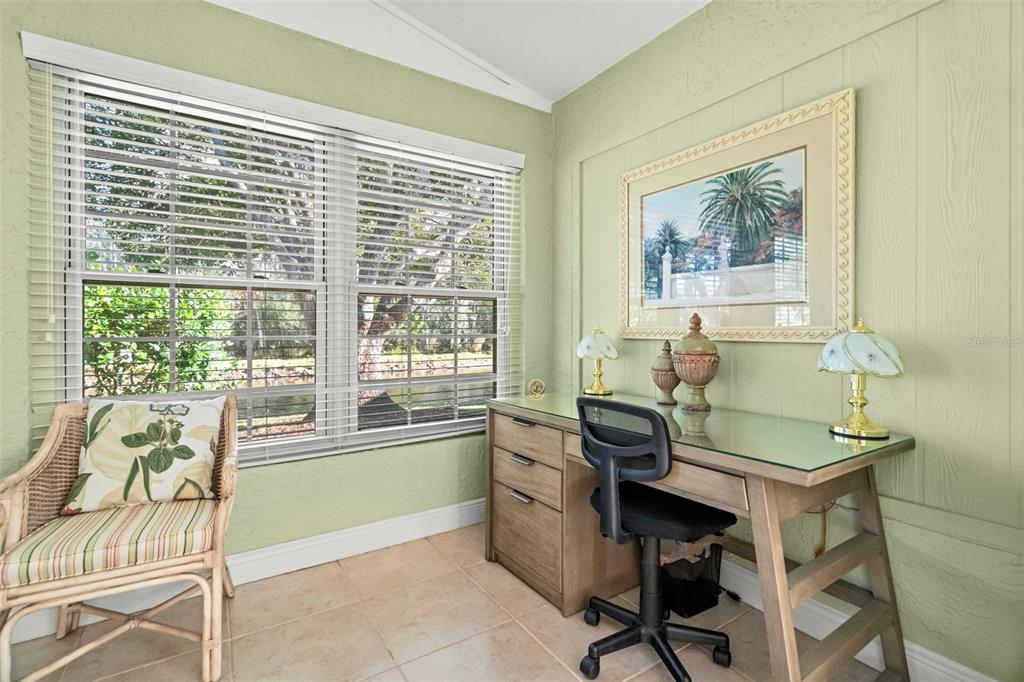 4730 Sheffield Drive New Port Richey, FL 34655 - Photo 28 of 53 a view of a workspace with furniture and a window