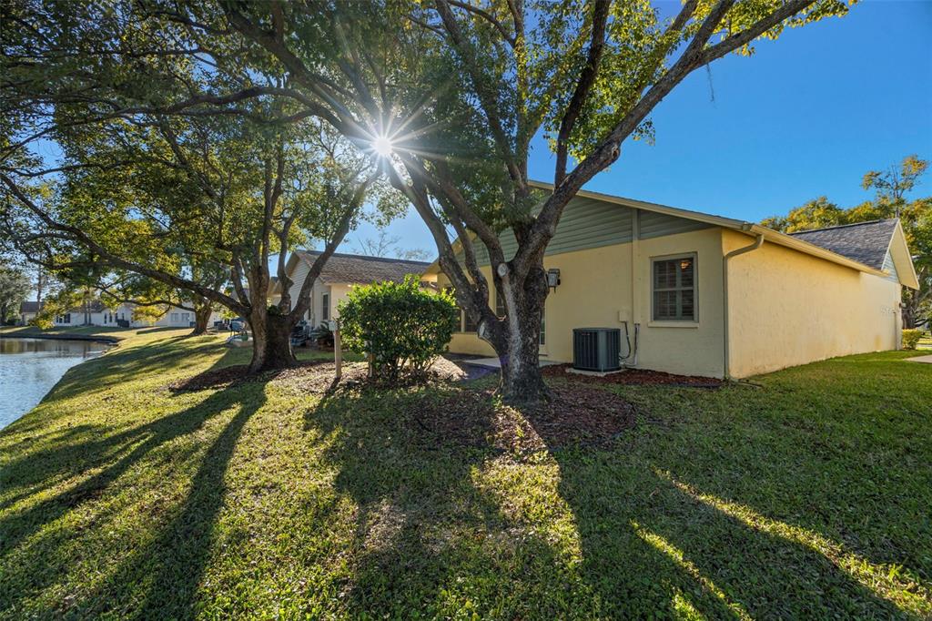 4730 Sheffield Drive New Port Richey, FL 34655 - Photo 29 of 53 a view of backyard of house with green space