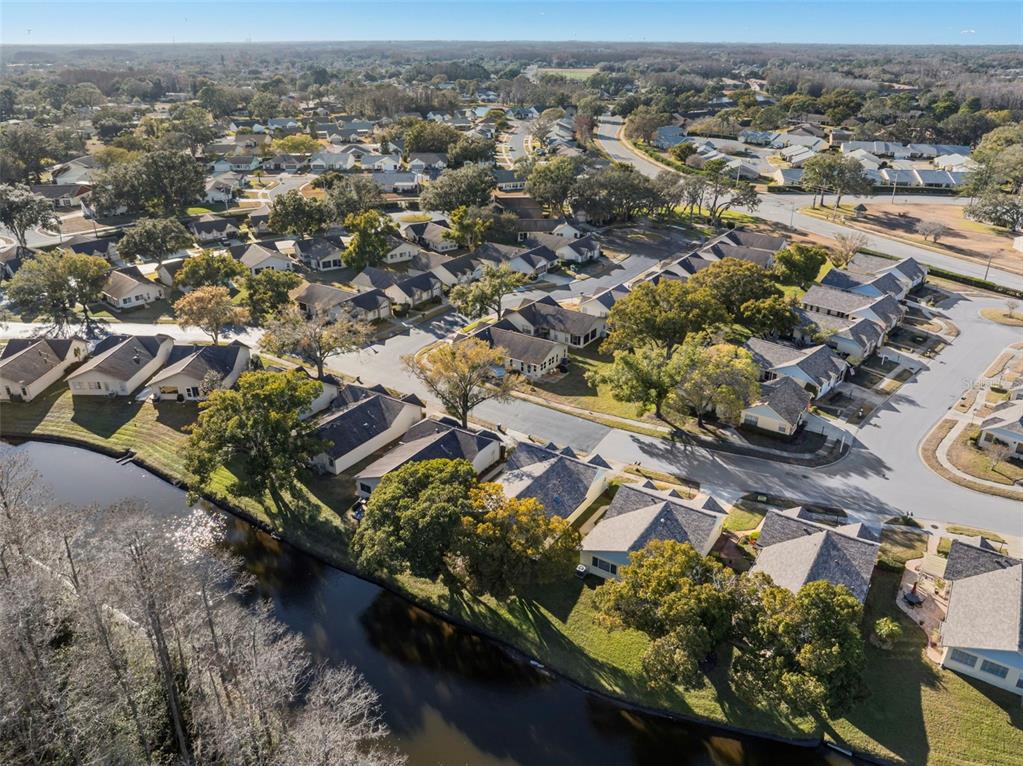 4730 Sheffield Drive New Port Richey, FL 34655 - Photo 35 of 53 an aerial view of residential houses with outdoor space