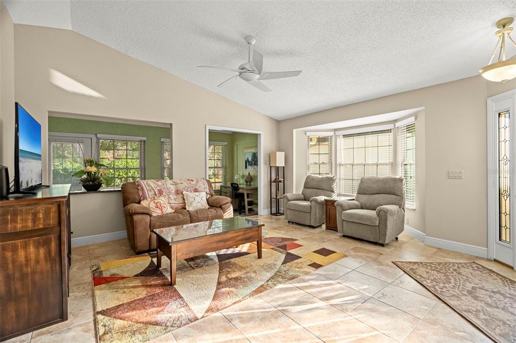 4730 Sheffield Drive New Port Richey, FL 34655 - Photo 7 of 53 a living room with furniture and a window