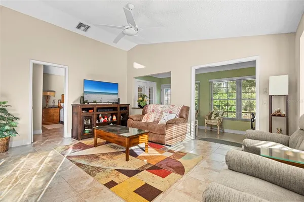 a view of a dining room with furniture window and outside view