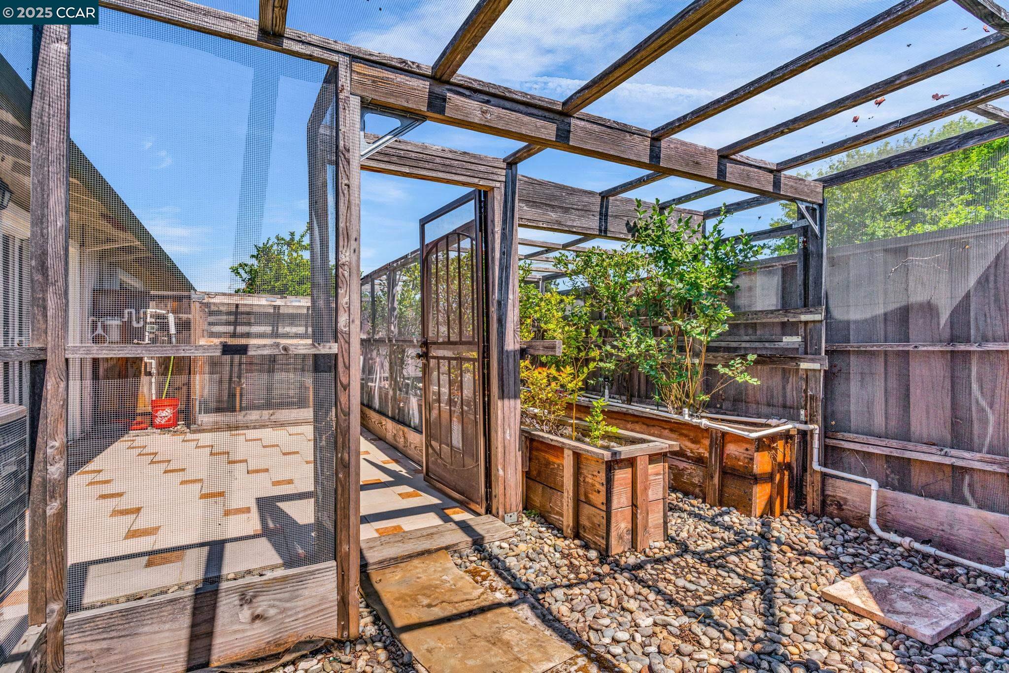 4380 St Charles Place Concord, CA 94521 - Photo 37 of 54 a outdoor view of a house with wooden floor