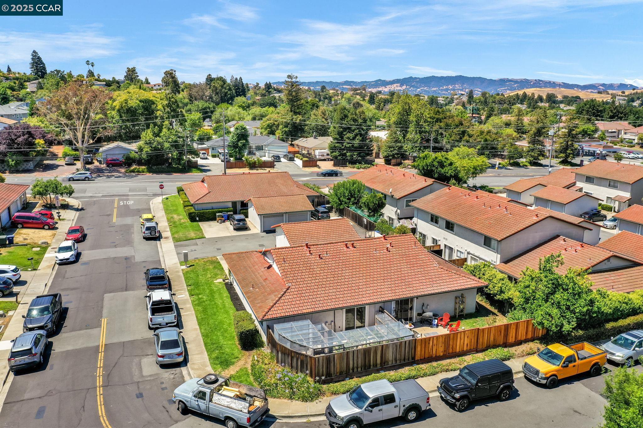 4380 St Charles Place Concord, CA 94521 - Photo 45 of 54 an aerial view of a swimming pool patio and mountain view