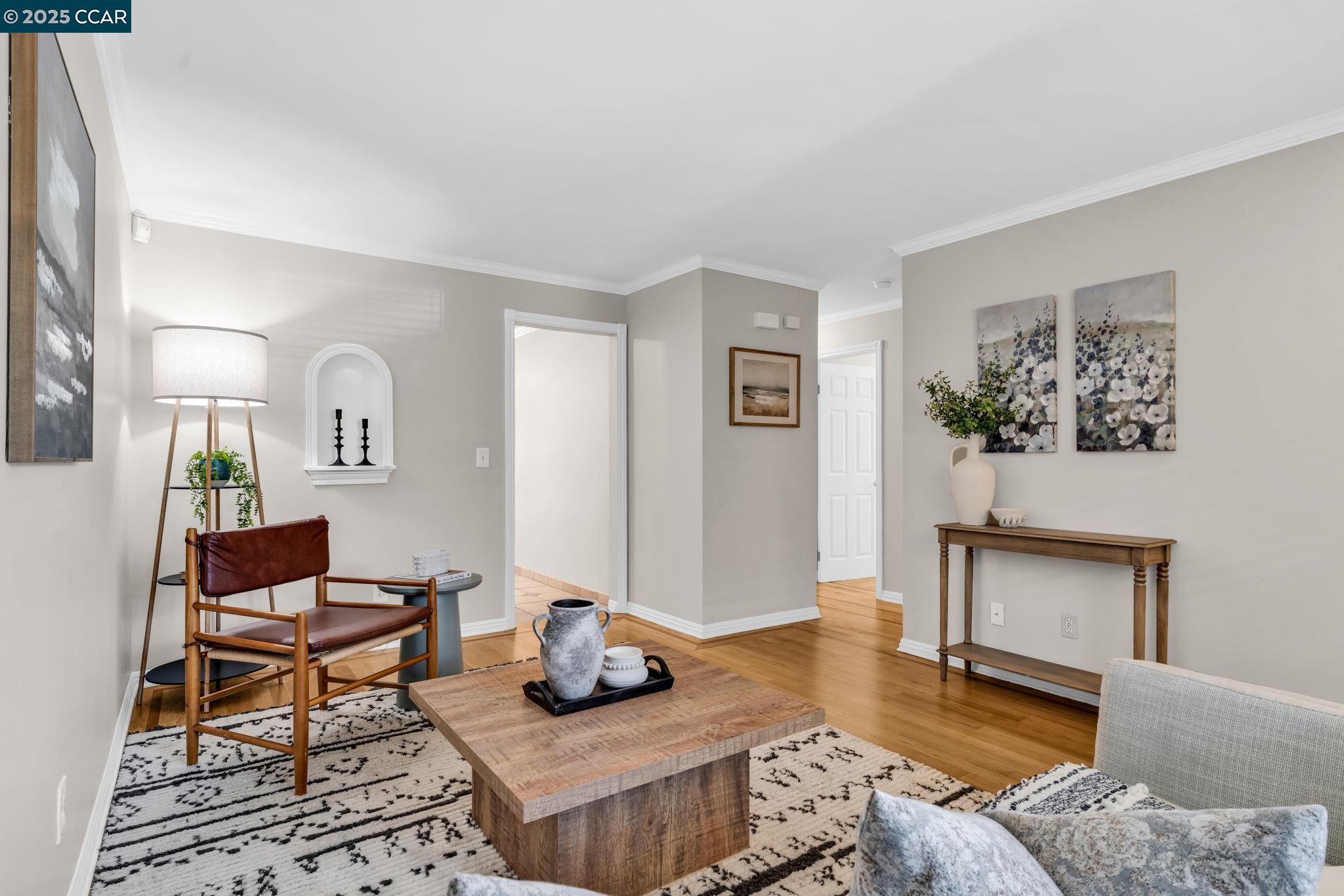 4380 St Charles Place Concord, CA 94521 - Photo 6 of 54 a living room with furniture and a wooden floor