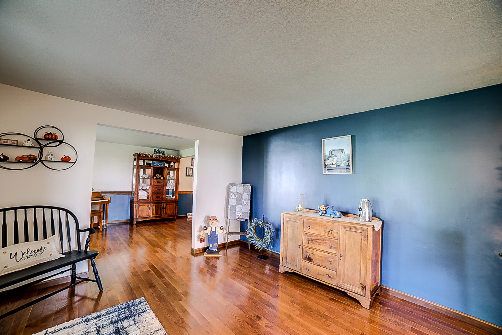 1718 North 1800 East Road Watseka, IL 60970 - Photo 19 of 113 a view of a workspace with furniture and wooden floor