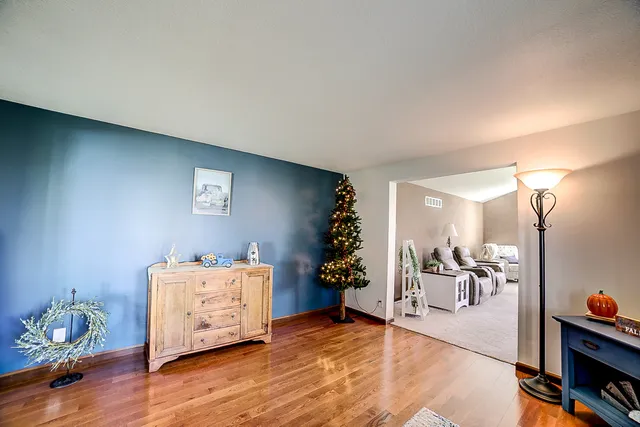 a large kitchen with stainless steel appliances lots of counter space and a sink