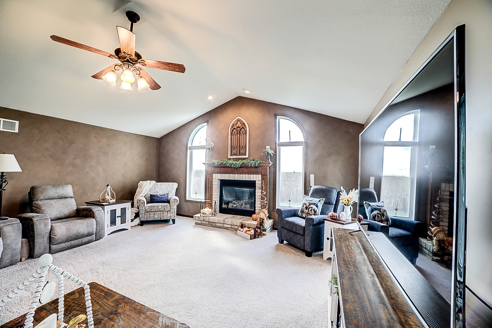 1718 North 1800 East Road Watseka, IL 60970 - Photo 26 of 113 a view of a livingroom with furniture and a fireplace
