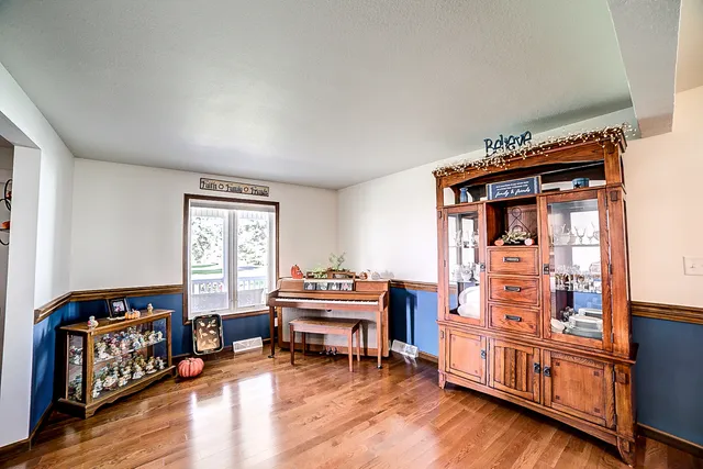 a bathroom with a double vanity sink mirror and shower