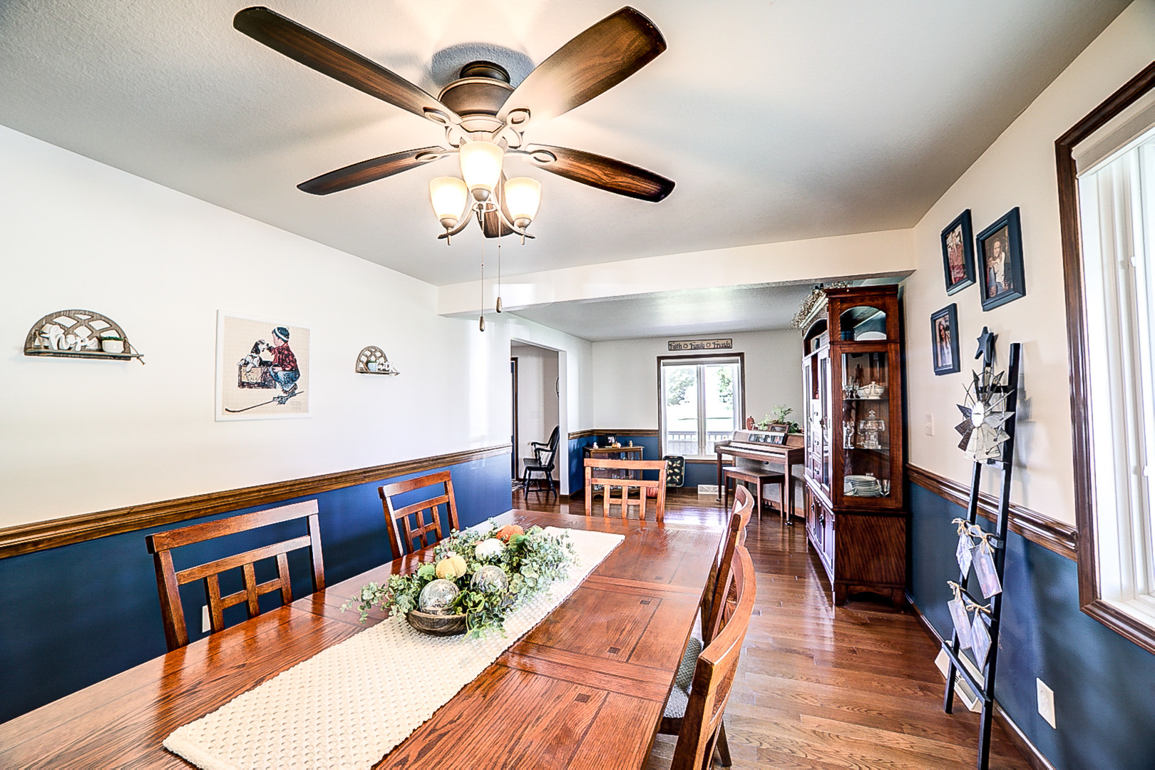 1718 North 1800 East Road Watseka, IL 60970 - Photo 31 of 113 a view of a dining room with furniture a chandelier and wooden floor
