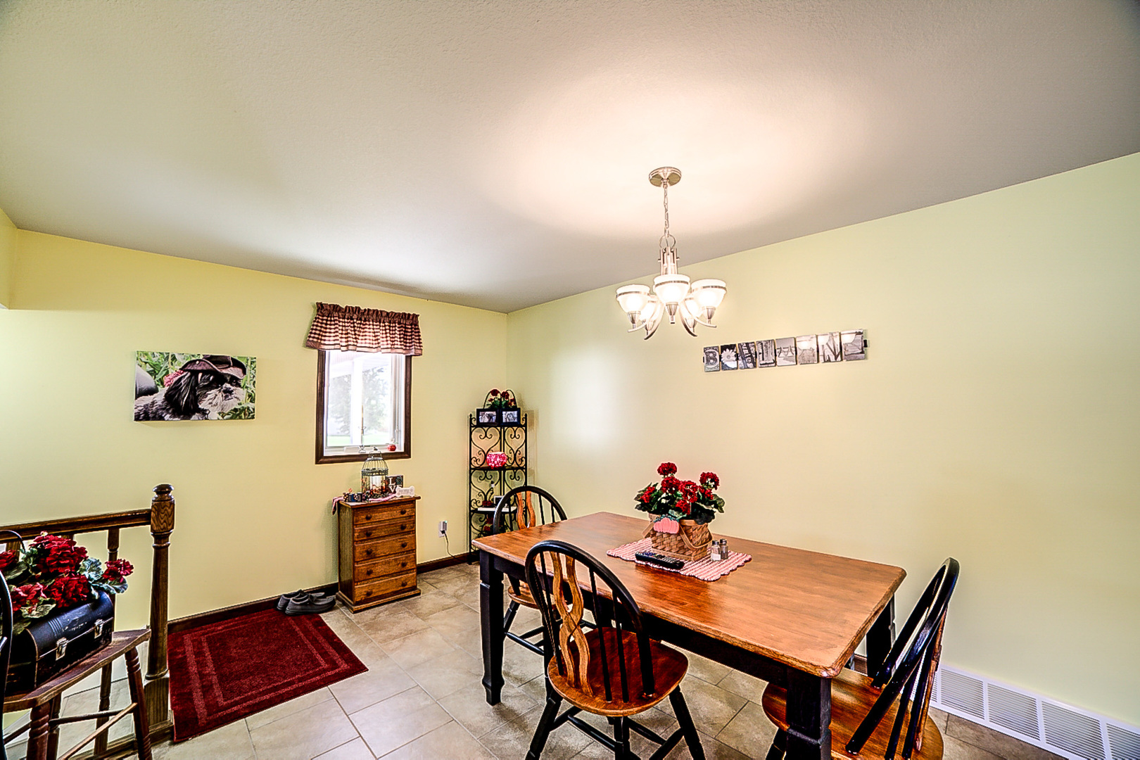 1718 North 1800 East Road Watseka, IL 60970 - Photo 40 of 113 a view of a dining room with furniture and a chandelier