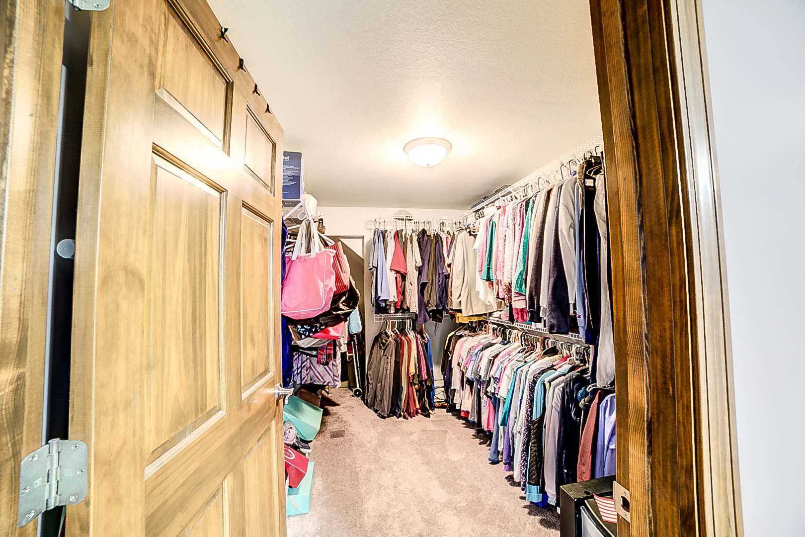 1718 North 1800 East Road Watseka, IL 60970 - Photo 53 of 113 a view of walk in closet with clothes