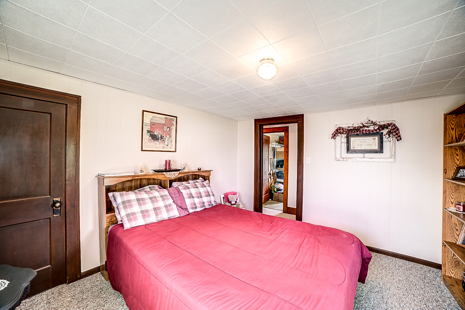 1718 North 1800 East Road Watseka, IL 60970 - Photo 61 of 113 a bedroom with a bed and wooden floor