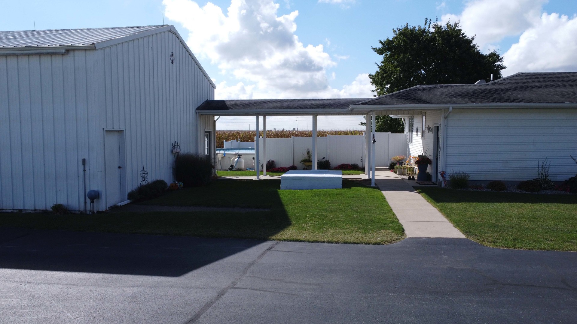 1718 North 1800 East Road Watseka, IL 60970 - Photo 10 of 113 a view of a house with backyard sitting area and garden