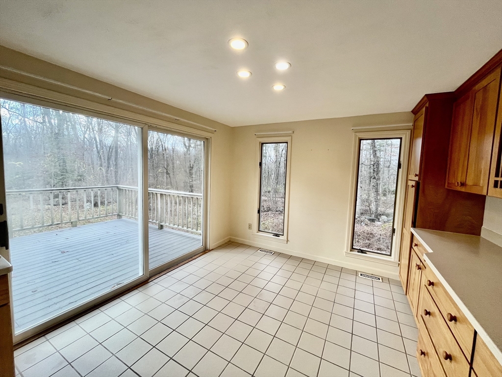 21 Hutchinson Road Sutton, MA 01590 - Photo 12 of 41 a view of an empty room with window and cabinet