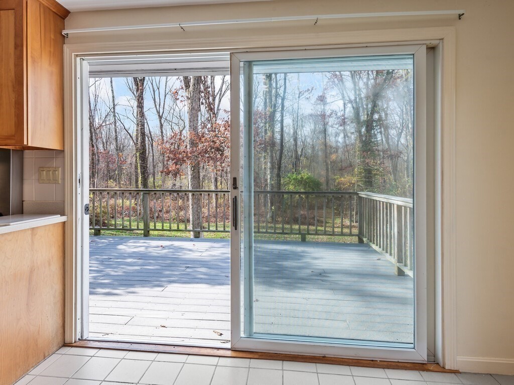 21 Hutchinson Road Sutton, MA 01590 - Photo 13 of 41 a view of a room with wooden floor and door