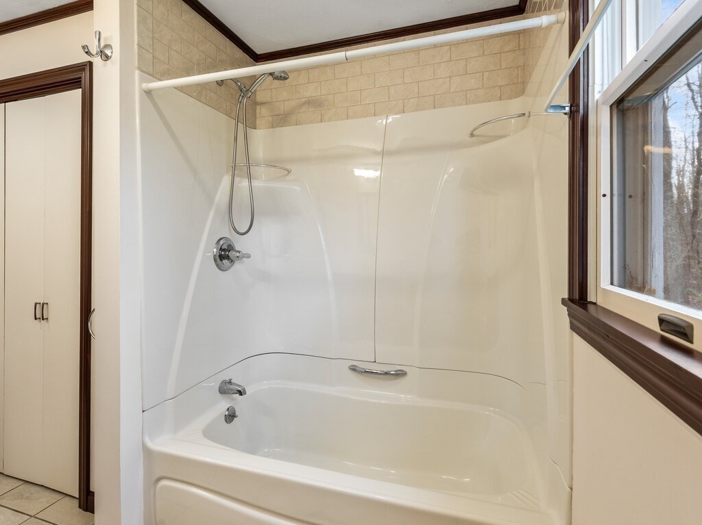 21 Hutchinson Road Sutton, MA 01590 - Photo 17 of 41 a bathroom with a shower and a bath tub