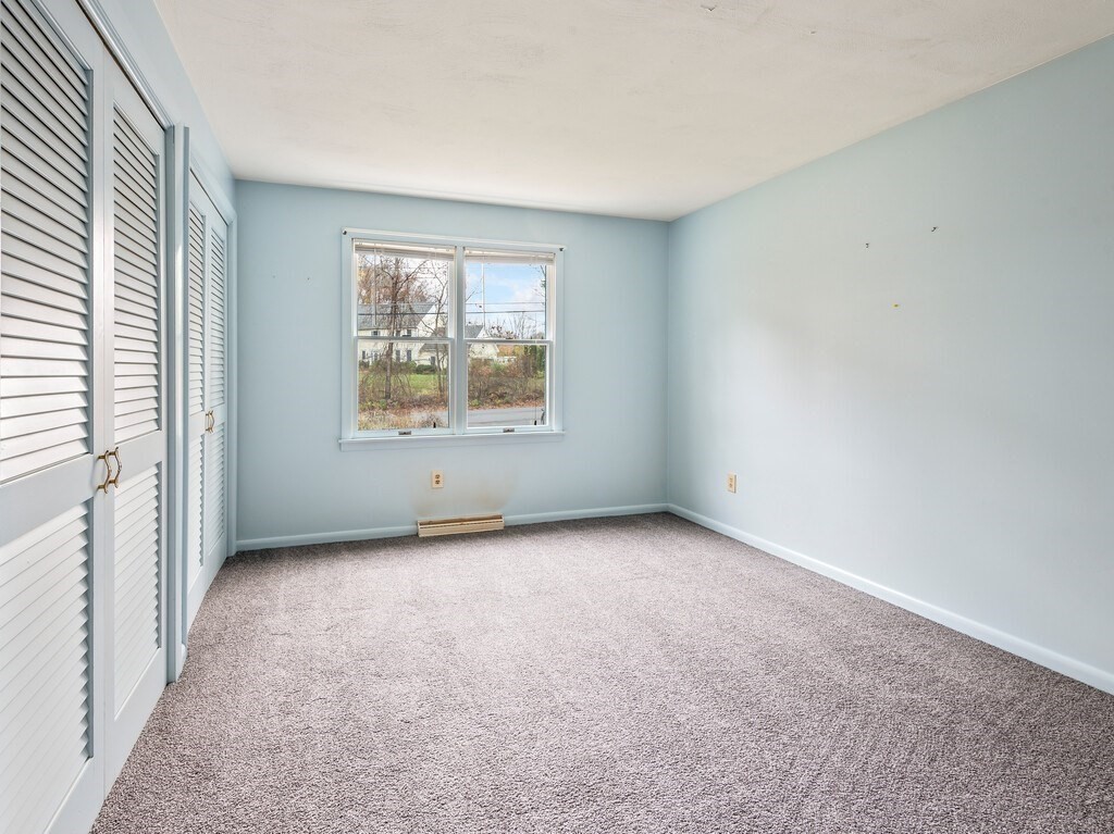 21 Hutchinson Road Sutton, MA 01590 - Photo 18 of 41 an empty room with a window