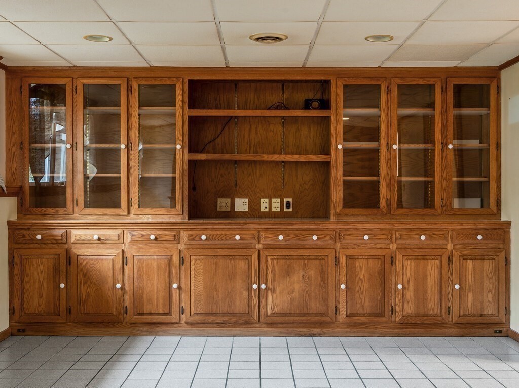 21 Hutchinson Road Sutton, MA 01590 - Photo 24 of 41 a view of a entryway with wooden cabinets