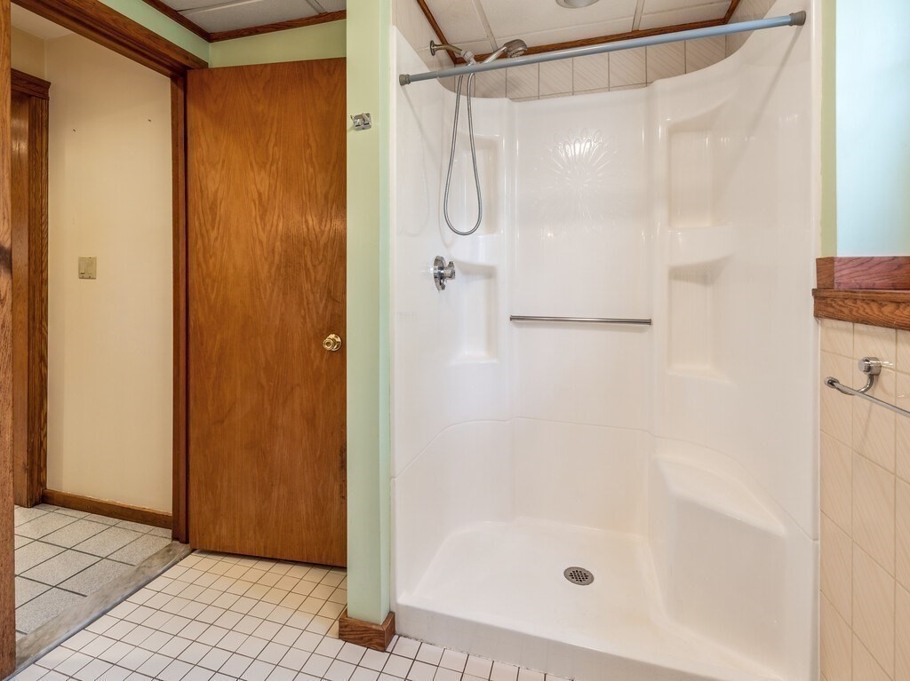 21 Hutchinson Road Sutton, MA 01590 - Photo 30 of 41 a bathroom with a glass shower door