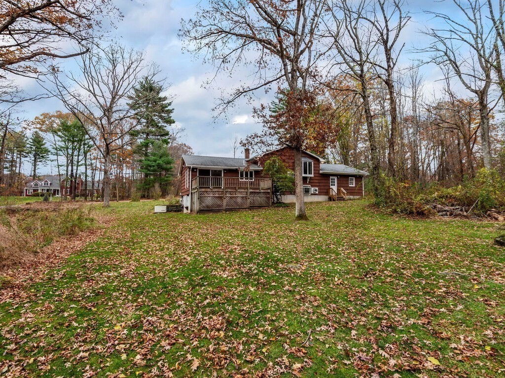 21 Hutchinson Road Sutton, MA 01590 - Photo 34 of 41 a view of a house with a yard