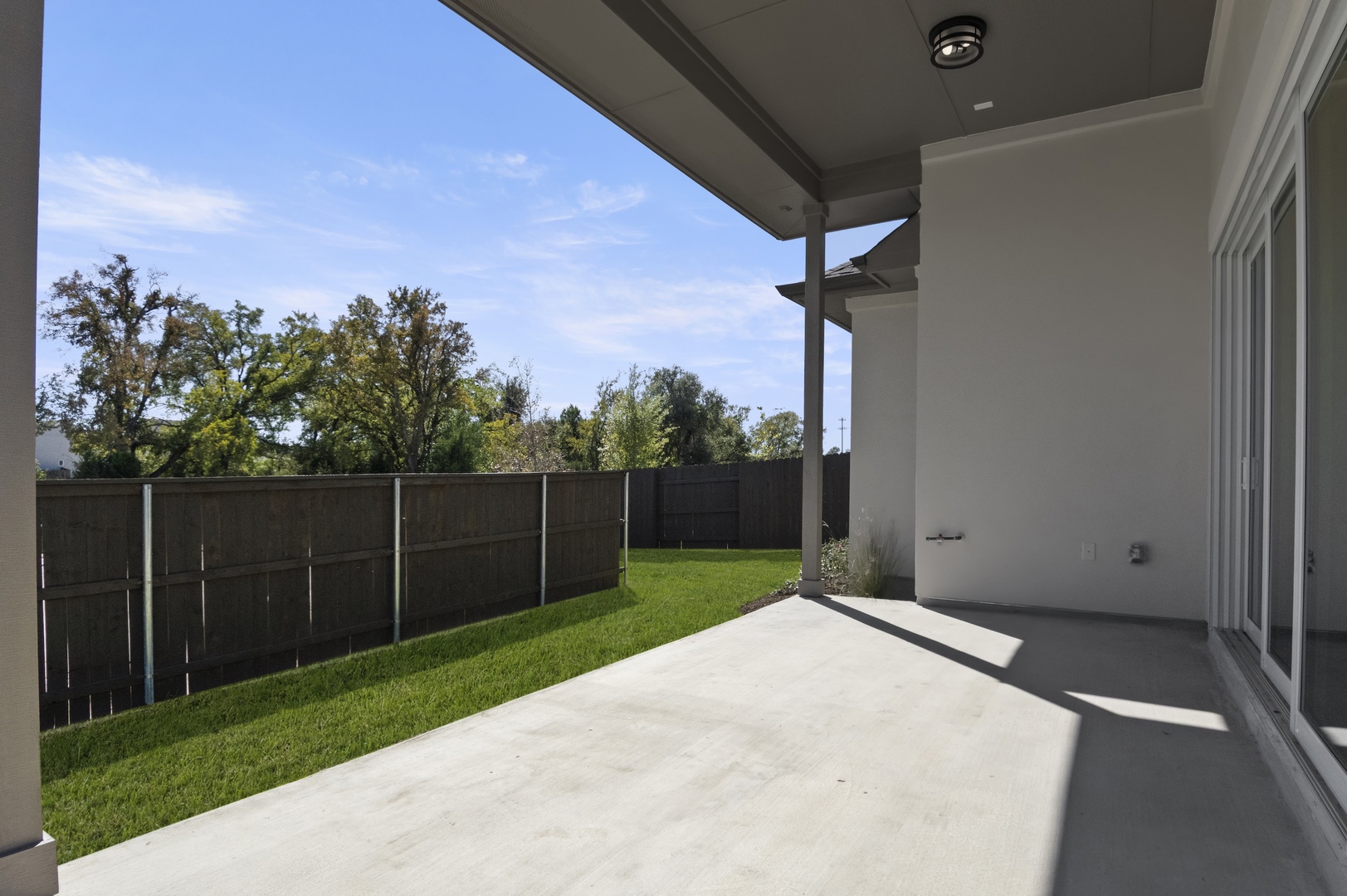 601 C-Bar Ranch Trail, Unit 59 Cedar Park, TX 78613 - Photo 32 of 34 Fenced backyard with a patio