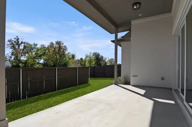 a view of backyard with green space