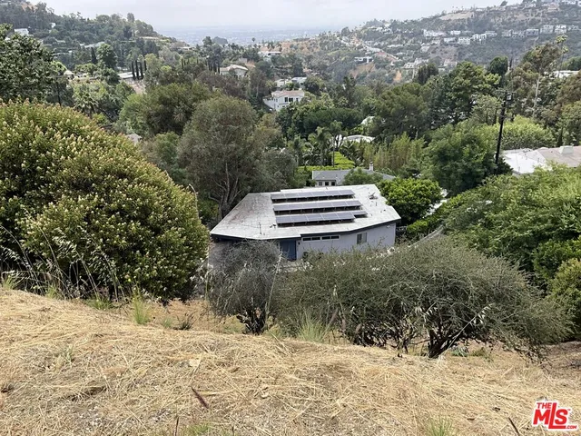 a view of a yard with mountain