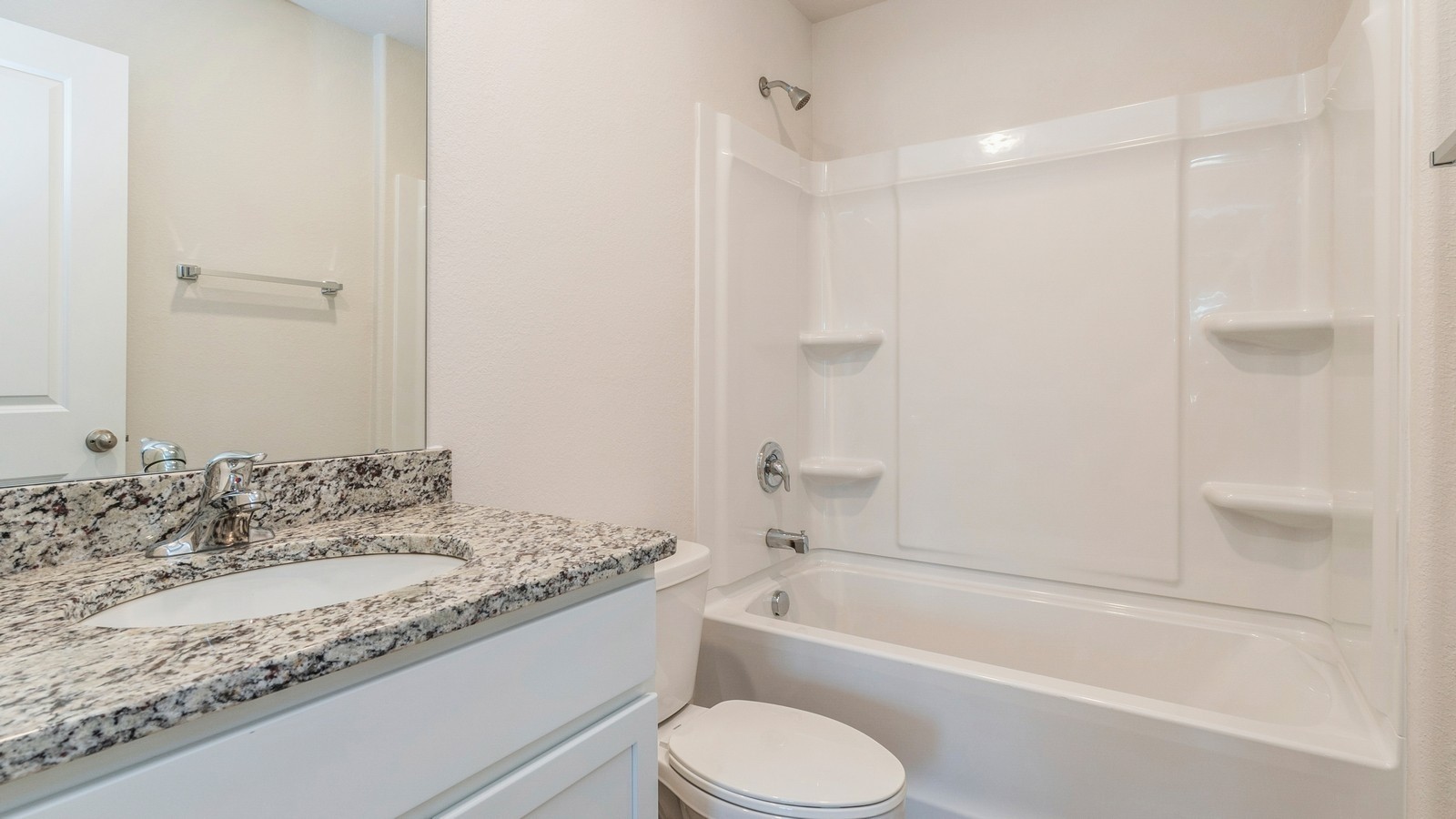 2309 Nabali Way Murfreesboro, TN 37127 - Photo 29 of 38 a bathroom with a granite countertop sink toilet and bathtub