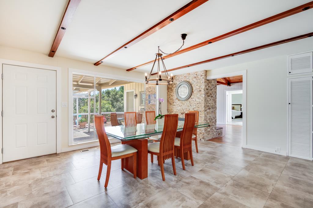 22930 Summit Road Los Gatos, CA 95033 - Photo 15 of 50 a view of a dining room with furniture window and wooden floor