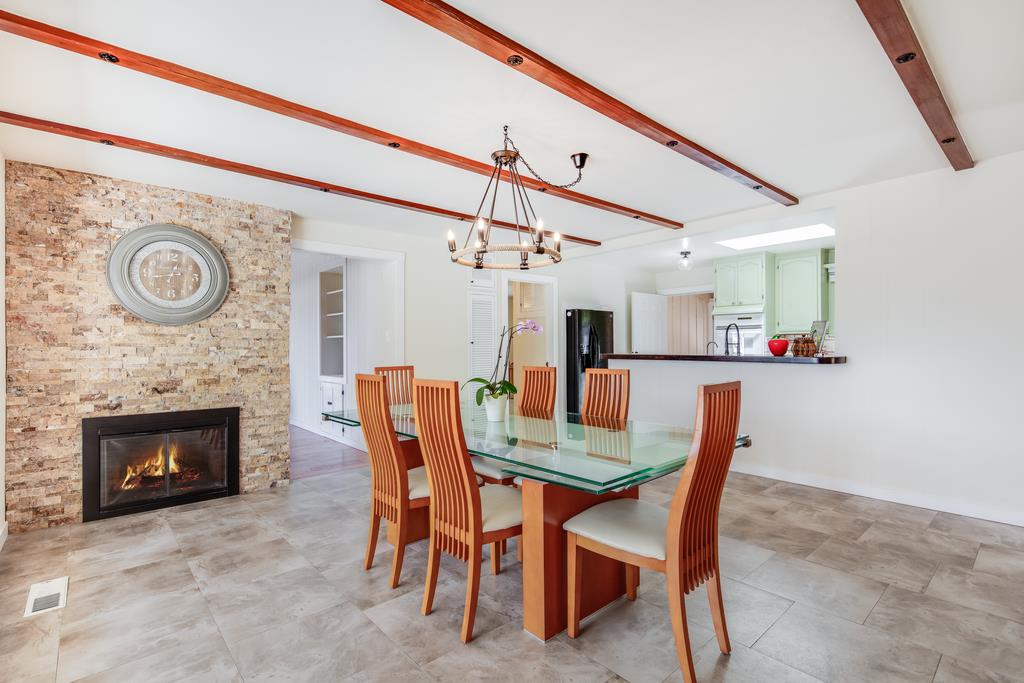 22930 Summit Road Los Gatos, CA 95033 - Photo 16 of 50 a dining room with furniture and a fireplace