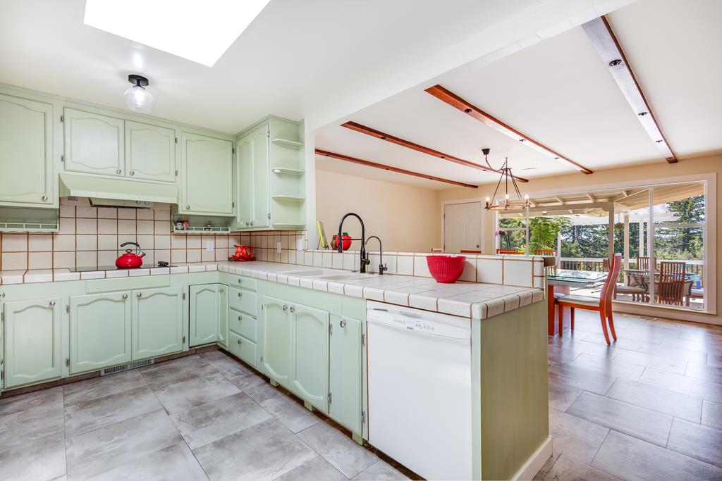 22930 Summit Road Los Gatos, CA 95033 - Photo 20 of 50 a kitchen that has a sink and a microwave
