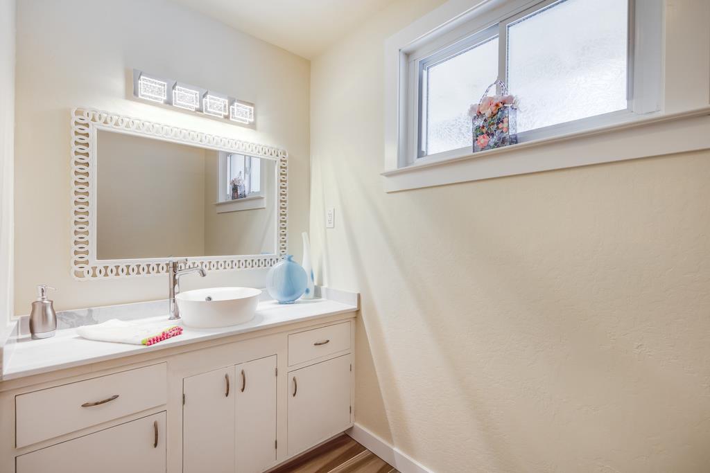 22930 Summit Road Los Gatos, CA 95033 - Photo 25 of 50 a bathroom with a sink and a mirror