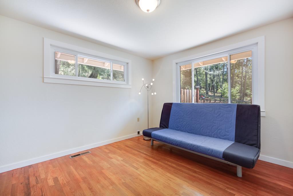 22930 Summit Road Los Gatos, CA 95033 - Photo 26 of 50 a living room with furniture and a window