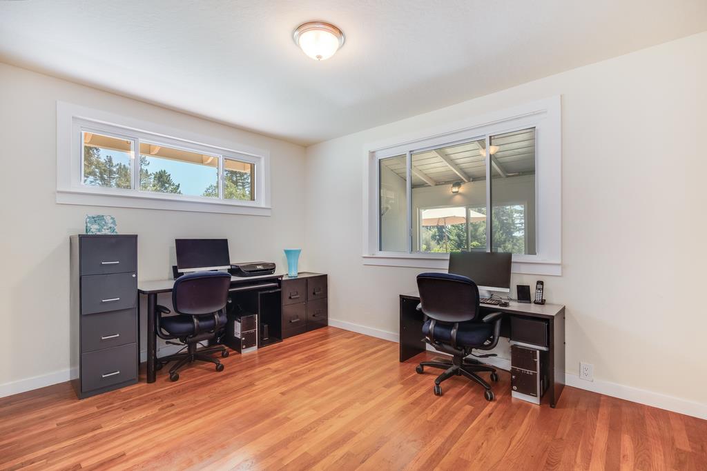 22930 Summit Road Los Gatos, CA 95033 - Photo 27 of 50 a view of a workspace with furniture and a window