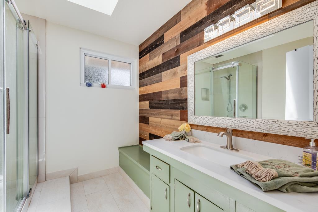 22930 Summit Road Los Gatos, CA 95033 - Photo 28 of 50 a bathroom with a sink and a mirror