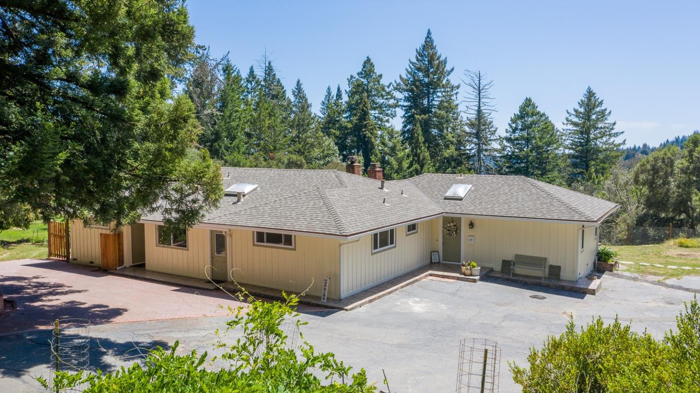 22930 Summit Road Los Gatos, CA 95033 - Photo 3 of 50 a aerial view of a house with a yard and large tree