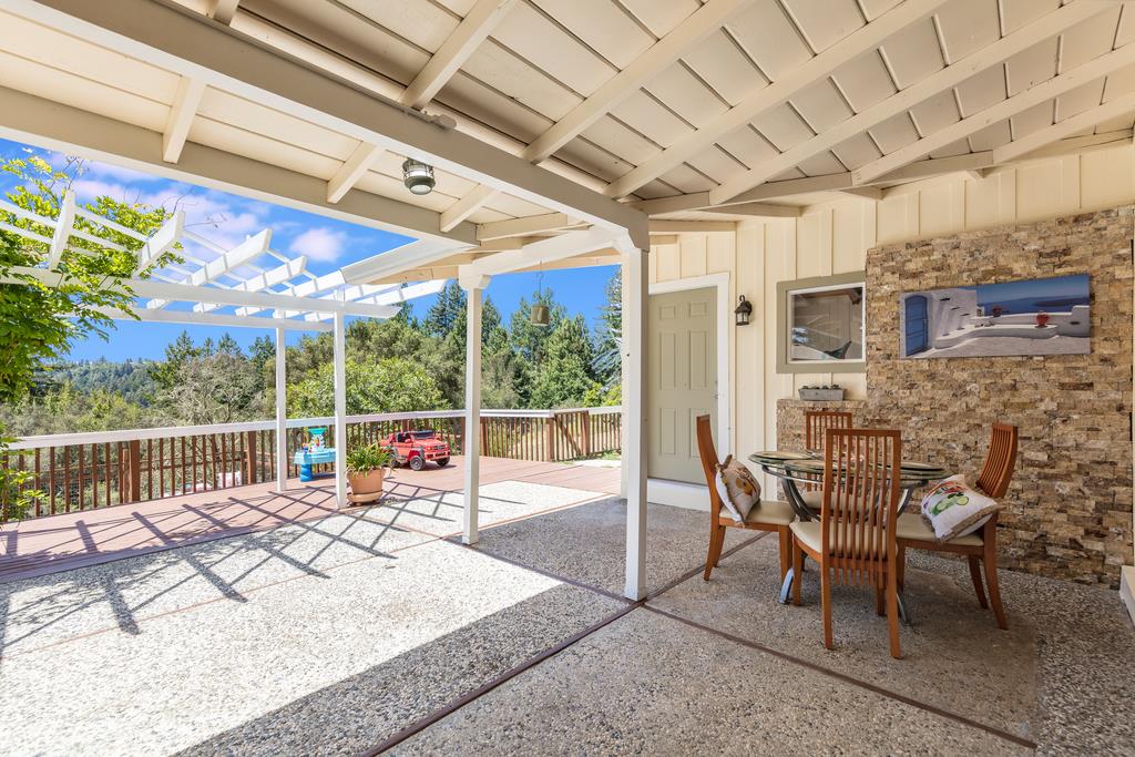 22930 Summit Road Los Gatos, CA 95033 - Photo 31 of 50 a view of a patio with a table and chairs