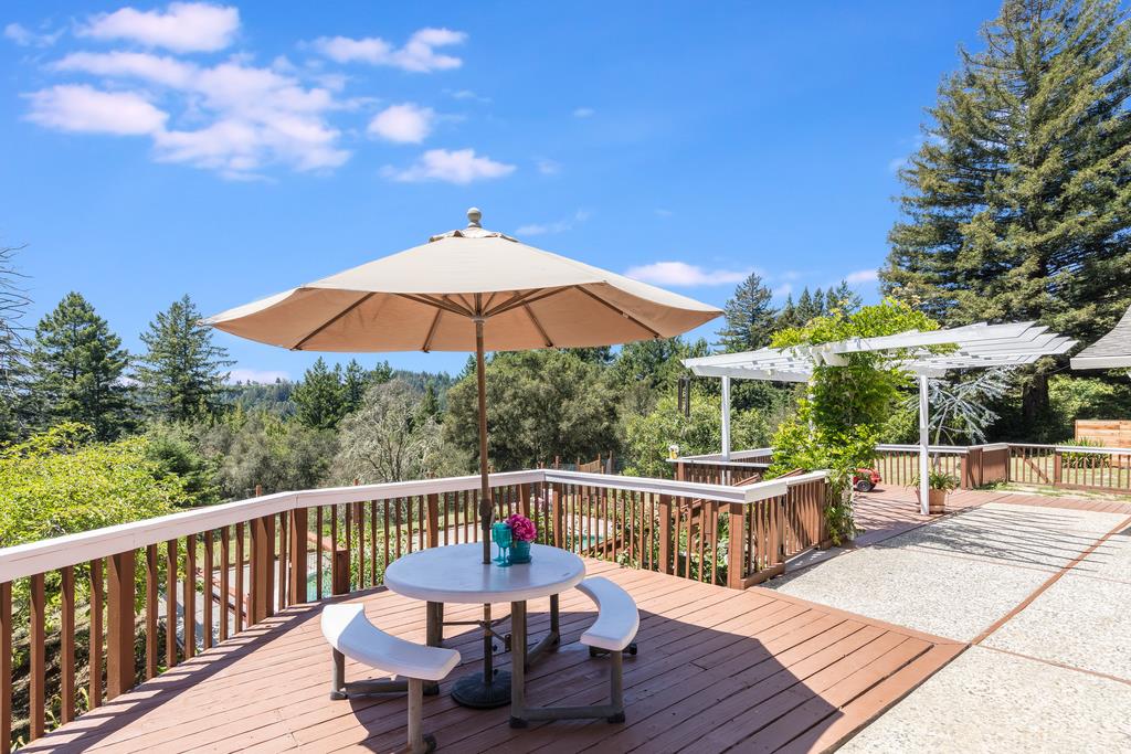 22930 Summit Road Los Gatos, CA 95033 - Photo 33 of 50 a view of a deck with furniture and a yard