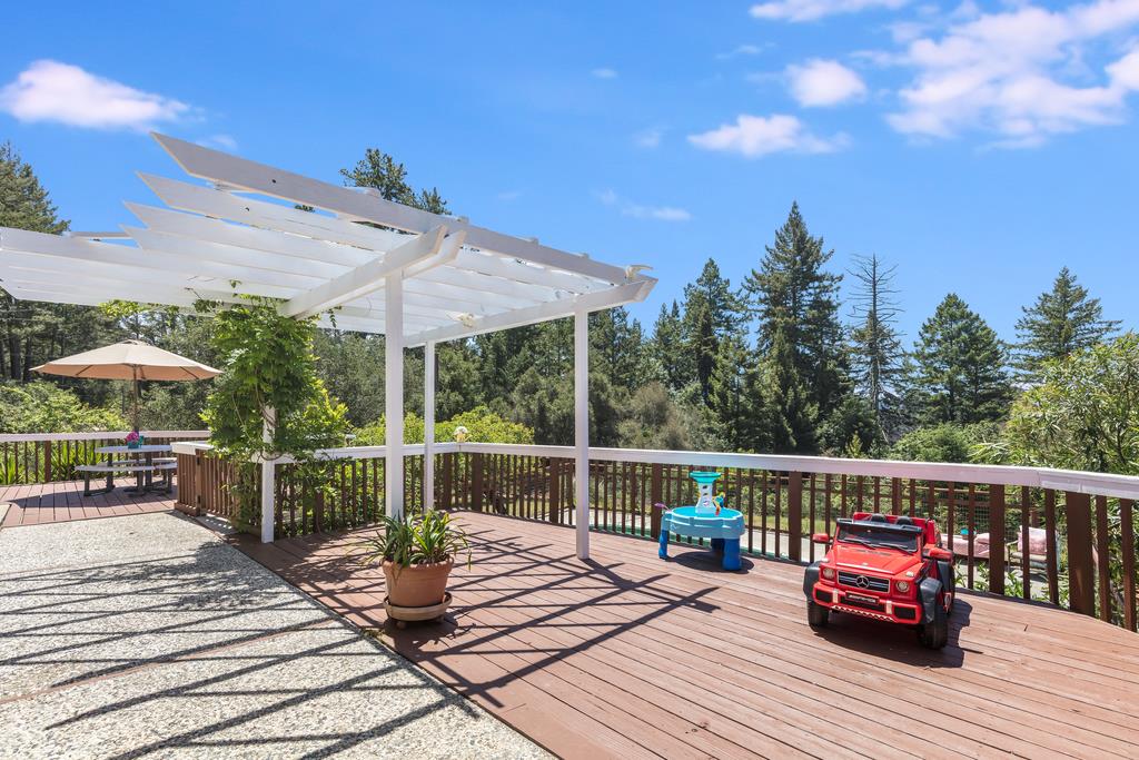 22930 Summit Road Los Gatos, CA 95033 - Photo 34 of 50 a view of a wooden deck with furniture
