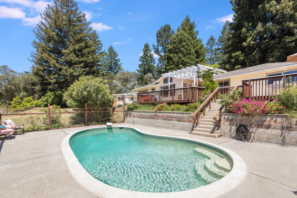 22930 Summit Road Los Gatos, CA 95033 - Photo 35 of 50 a view of a swimming pool with a patio