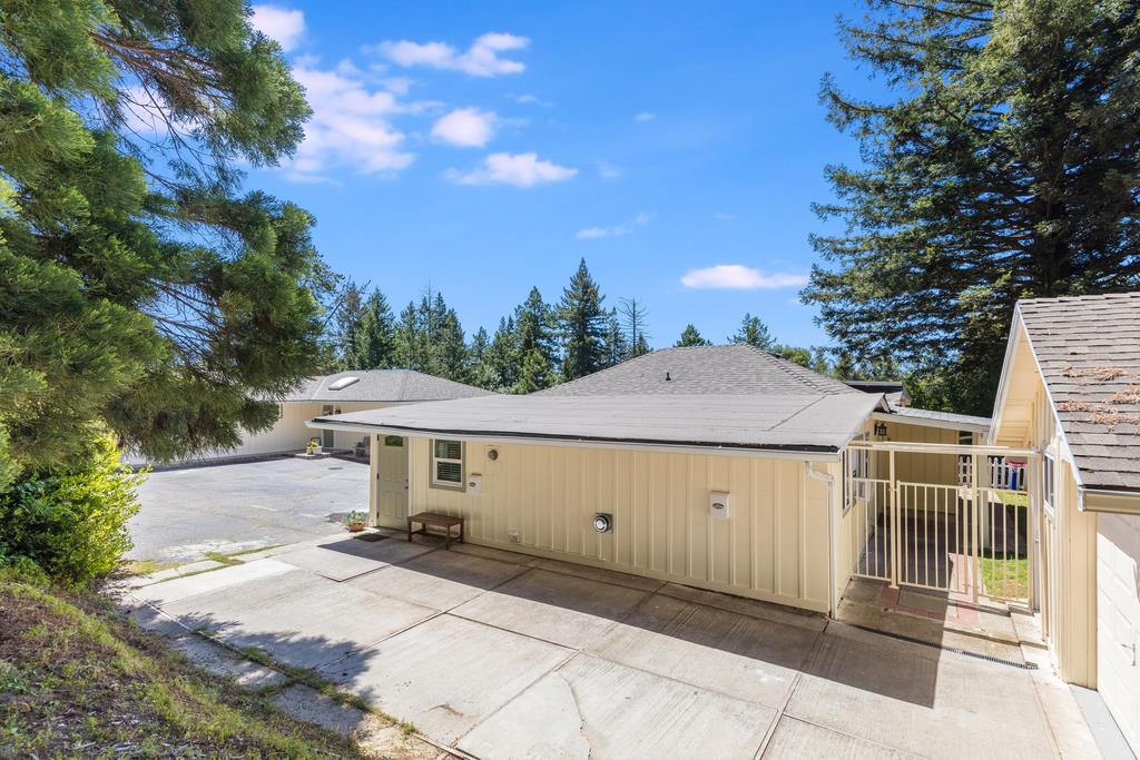 22930 Summit Road Los Gatos, CA 95033 - Photo 40 of 50 a front view of a house with a yard