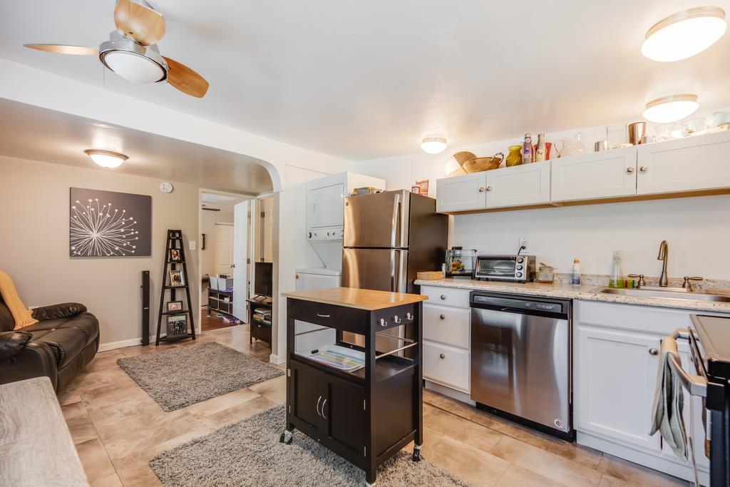 22930 Summit Road Los Gatos, CA 95033 - Photo 41 of 50 a kitchen with cabinets and stainless steel appliances