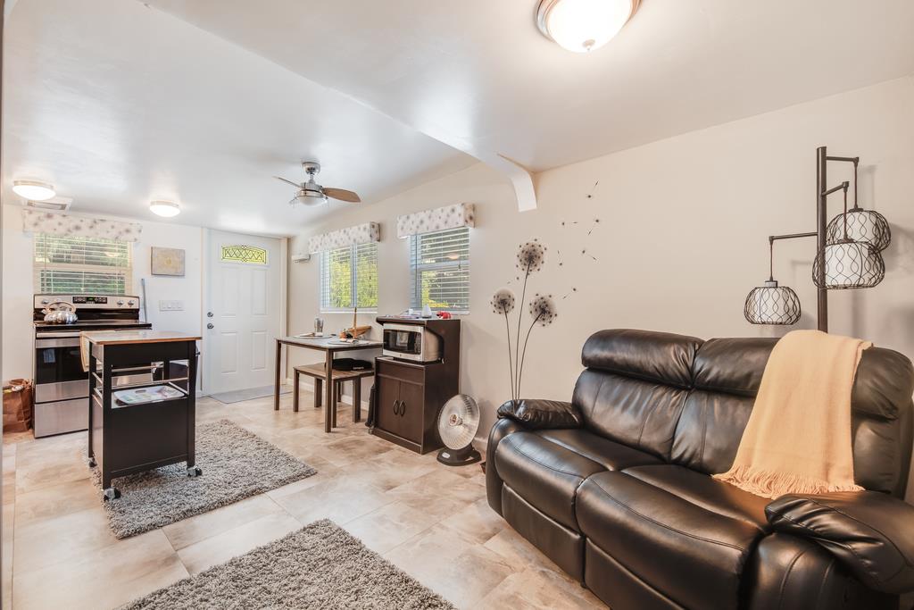 22930 Summit Road Los Gatos, CA 95033 - Photo 42 of 50 a living room with furniture and kitchen