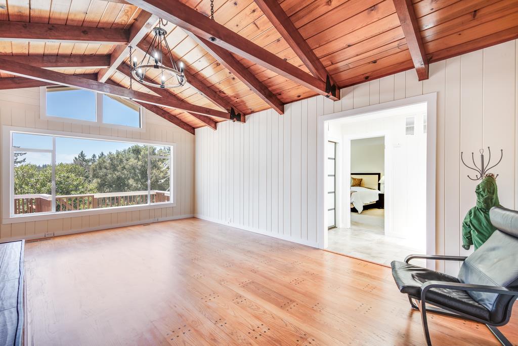 22930 Summit Road Los Gatos, CA 95033 - Photo 9 of 50 a view of livingroom with furniture and floor to ceiling window