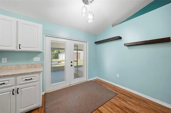 a kitchen with a sink and cabinets