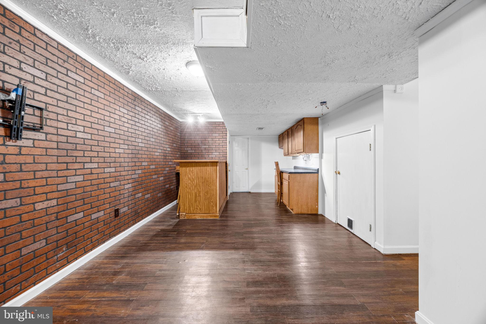 4613 Sandwood Road Sparrows Point, MD 21219 - Photo 36 of 68 Spacious basement with rustic charm.