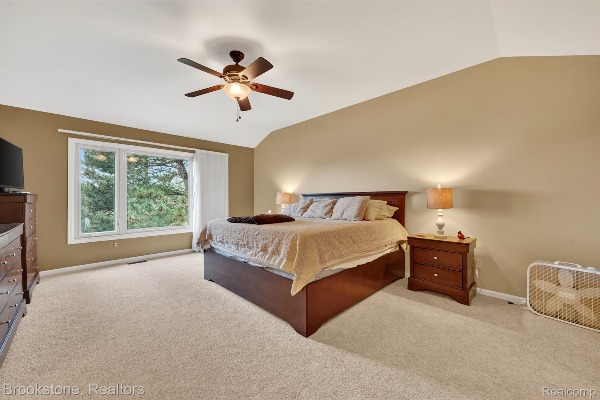 4054 Calumet Drive Rochester, MI 48306 - Photo 32 of 44 Bedroom featuring lofted ceiling, light carpet, and ceiling fan