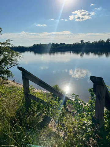 a view of a lake with a city