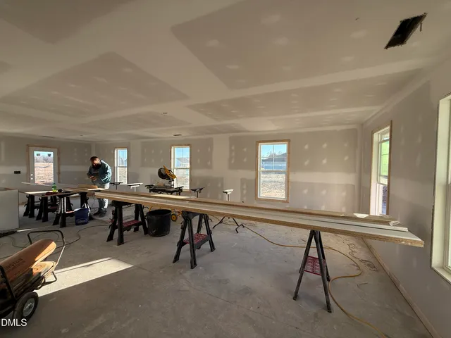 a room with furniture and a window